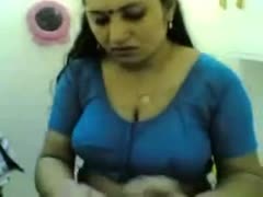 Cute and chubby Indian wifey teased on the sofa in front of livecam